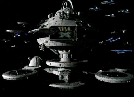 The R-1, seen again in the time of Picard and the NCC-1701-D.  Notice the greatly enlarged scale, when compared to a Galaxy Class cruiser.