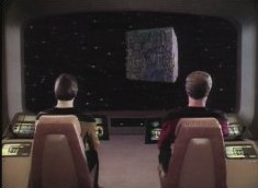 The Galaxy class USS Enterprise encounter's its first Borg Cube, after having been flung to the edge of the Delta Quadrant by the omnipotent Q.